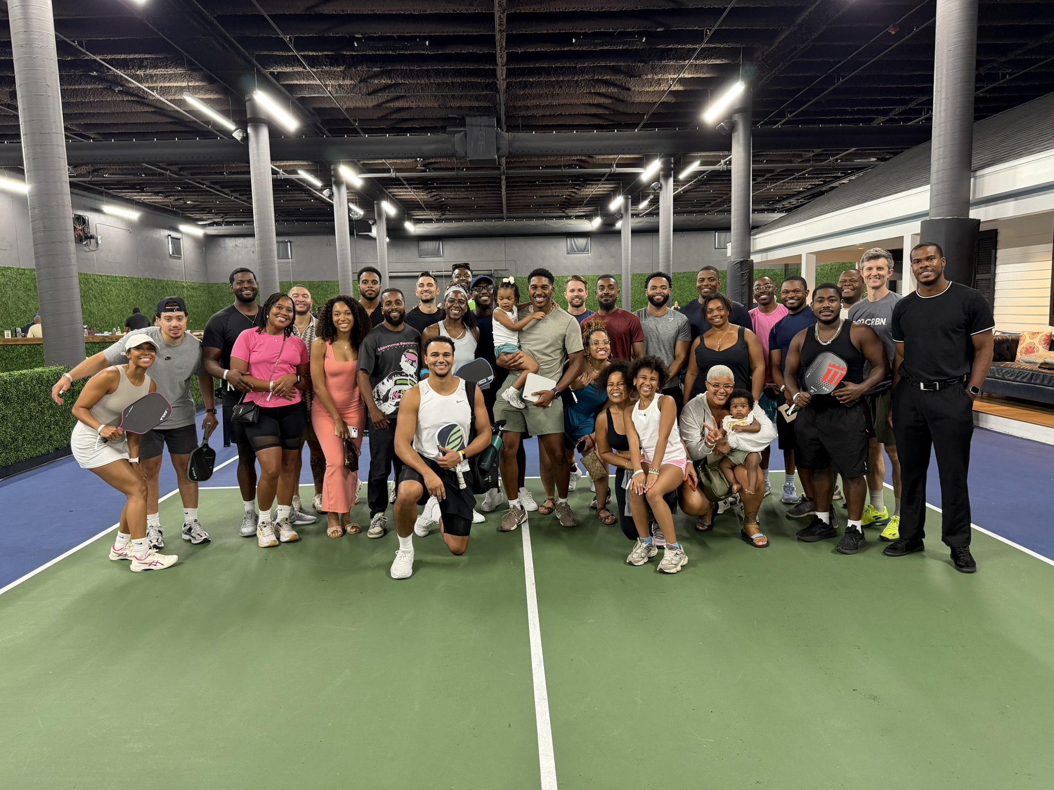 The full group of Court Culture #01 attendees gathered on the court