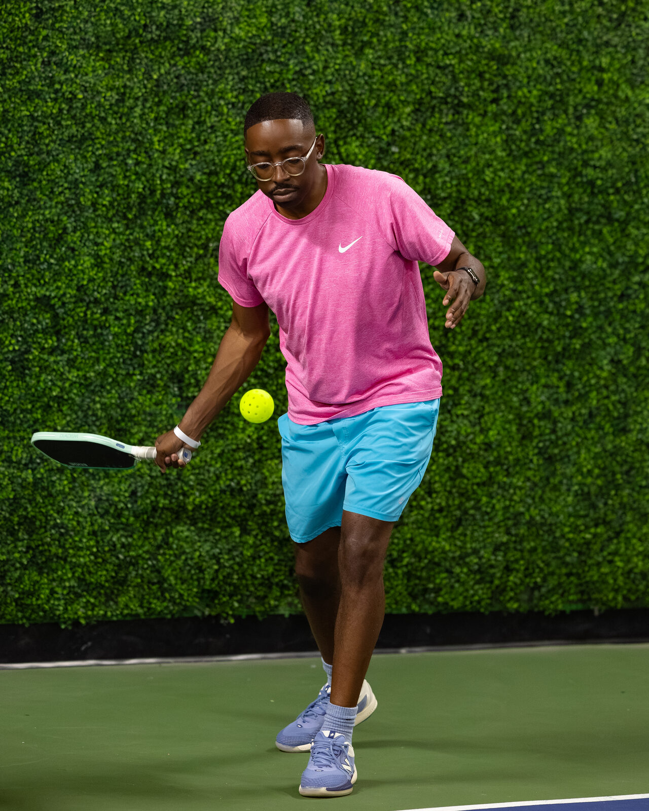 A player striking a forehand shot